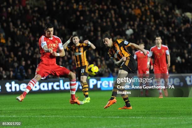 Hull City's George Boyd has a shot on goal during the Barclays Premier League match at the KC Stadium, Hull.