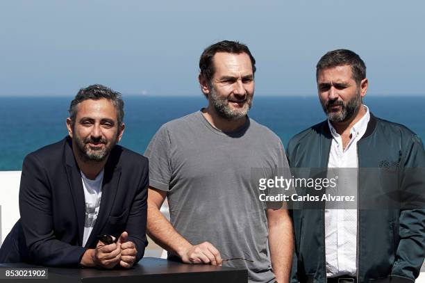 Eric Toledano, Olivier Nakache and Gilles Lellouche attend the 'Le Sens De La Fete / C'Est La Vie' photocall during the 65th San Sebastian...