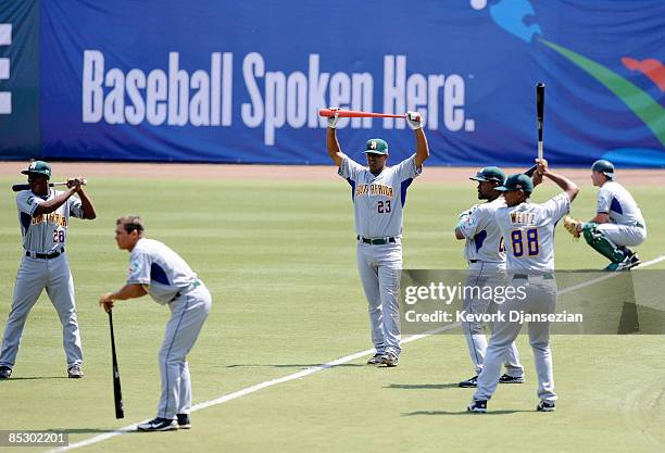 Members of the South Africa baseball team warm up before the start of their 2009 World Baseball Classic Pool B match against Cuba on March 8, 2009 at...