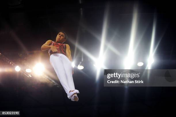 Alturk Bashar of Great Britain competes on the trampoline during the Trampoline, Tumbling & DMT British Championships at the Echo Arena on September...