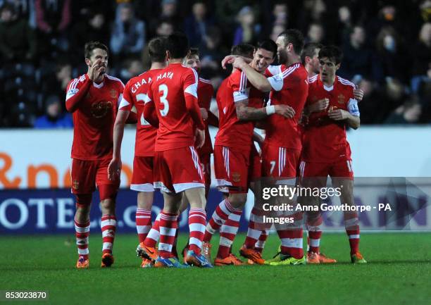 Southampton's Jose Fonte celebrates with his teammates after scoring his team's first goal during the Barclays Premier League match at the KC...