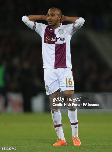 Aston Villa's Fabian Delph shows his dejection after missed chance during the Barclays Premier League match at the Cardiff City Stadium, Cardiff.