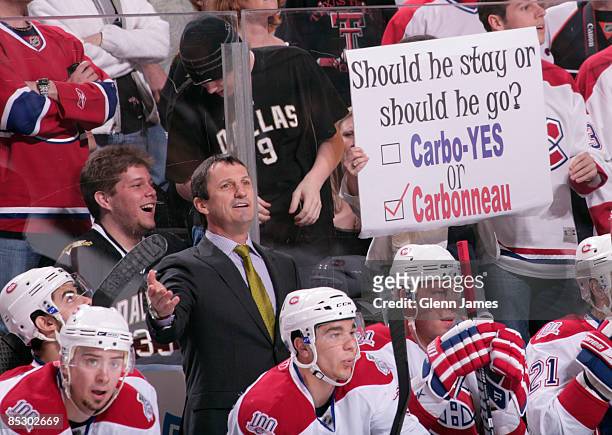 Dallas fan shows her support of former Star and current head coach Guy Carbonneau of the Montreal Canadiens during a game against the Dallas Stars on...