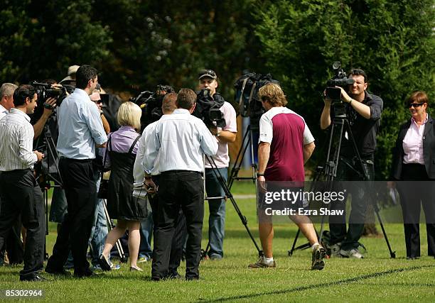 Head coach Des Hasler of the Sea Eagles walks to a group of waiting media during a Manly Warringah Sea Eagles NRL training session at the NSW Academy...