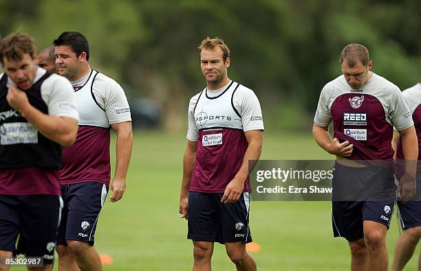 Brett Stewart of the Sea Eagles walks on to the field with teammates during for a Manly Warringah Sea Eagles NRL training session at the NSW Academy...