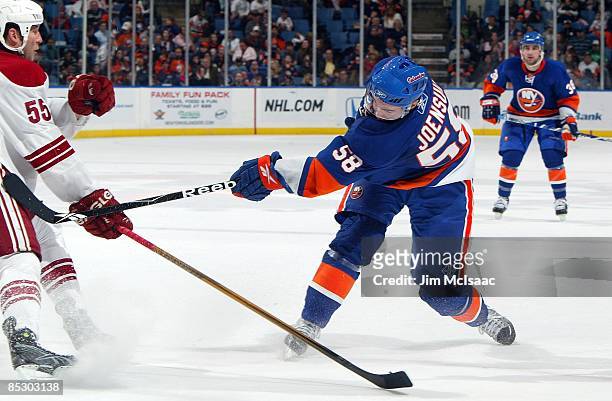 Jesse Joensuu of the New York Islanders skates against the Phoenix Coyotes on March 8, 2009 at Nassau Coliseum in Uniondale, New York. The Isles...