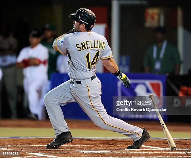 Chris Snelling of Australia hits a home run off pitcher Oliver Perez of Mexico during the first inning of the 2009 World Baseball Classic Pool B...