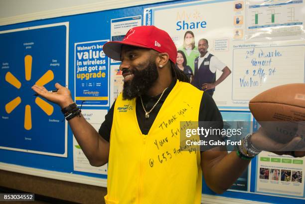 American football player Michael Griffin signs autographs and meets with customers to celebrate Being Active with Sports Illustrated Kids and Capri...