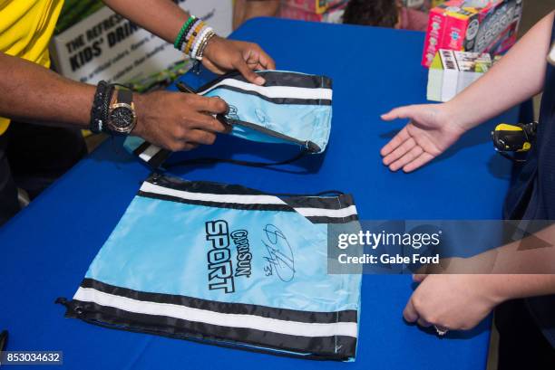 American football player Michael Griffin signs autographs and meets with customers at Walmart on September 23, 2017 in Hopkinsville, Kentucky.