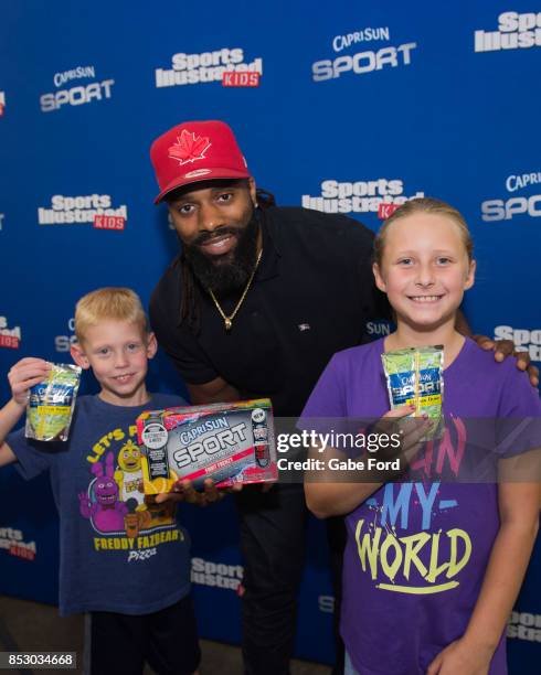 American football player Michael Griffin signs autographs and meets with customers at Walmart on September 23, 2017 in Hopkinsville, Kentucky.