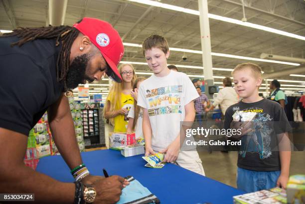 American football player Michael Griffin signs autographs and meets with customers at Walmart on September 23, 2017 in Hopkinsville, Kentucky.