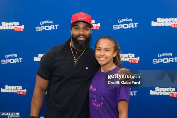 American football player Michael Griffin signs autographs and meets with customers at Walmart on September 23, 2017 in Hopkinsville, Kentucky.