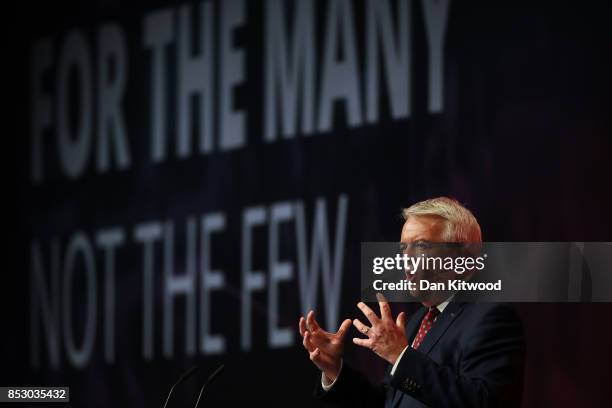 First Minister of Wales Carwyn Jones speaks in the main hall during day one of the Labour Party Conference on September 24, 2017 in Brighton,...