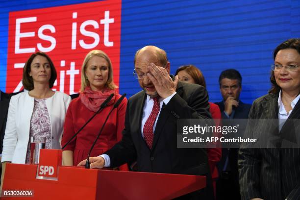 Chairman and candidate for Chancellor Martin Schulz reacts on stage with German Family Minister Katarina Barley , State Premier of...