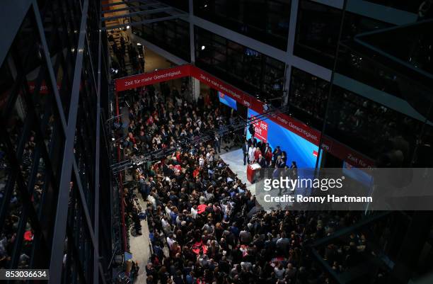 German Social Democrat and chancellor candidate Martin Schulz and supporters of the German Social Democrats react to initial results that give the...