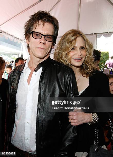 Actors Kevin Bacon and wife Kyra Sedgwick attend the 7th annual Stuart House Benefit held by John Varvatos and Converse at John Varvatos Boutique on...