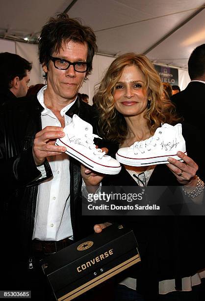 Actors Kevin Bacon and wife Kyra Sedgwick attend the 7th annual Stuart House Benefit held by John Varvatos and Converse at John Varvatos Boutique on...