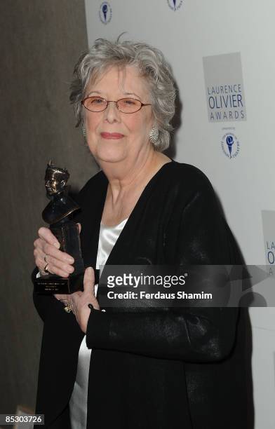 Margaret Tyzack poses with The Best Actress Award for The Chalk Garden presented by Russell Tovey during The Laurence Olivier Awards at The Grosvenor...