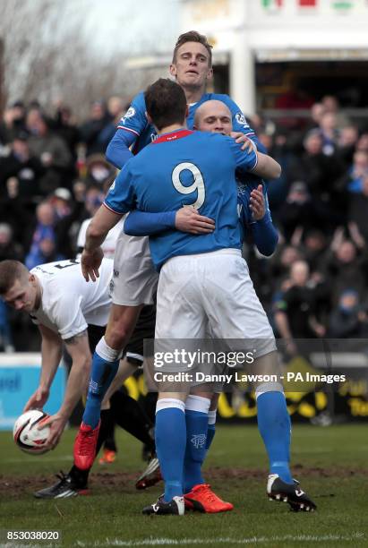 Rangers' Nicky Law celebrates his goal with Jon Daly and Dean Shiels during the Scottish League One match at Somerset Park, Ayr.