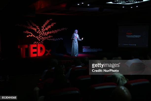 Palestinians standing on stage during TEDx Palestine conference, in Gaza city, on September 24, 2017.