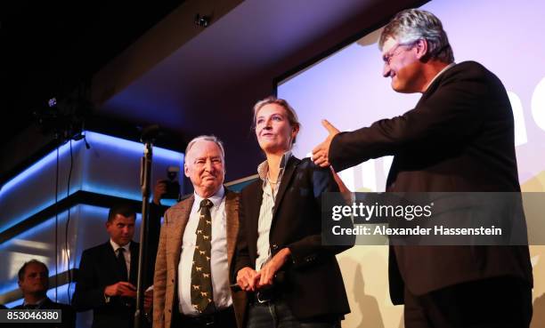 Alexander Gauland , Alice Weidel, co-leads candidate of the Alternative for Germany and Joerg Meuthen celebrate the initial results that give the...