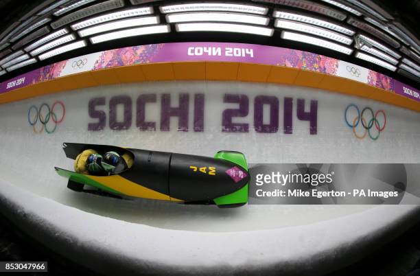 Jamaica's driver Winston Watts and brakeman Marvin Dixon in the Two-man Bobsleigh Heat One at the Sanki Sliding Centre during the 2014 Sochi Olympic...