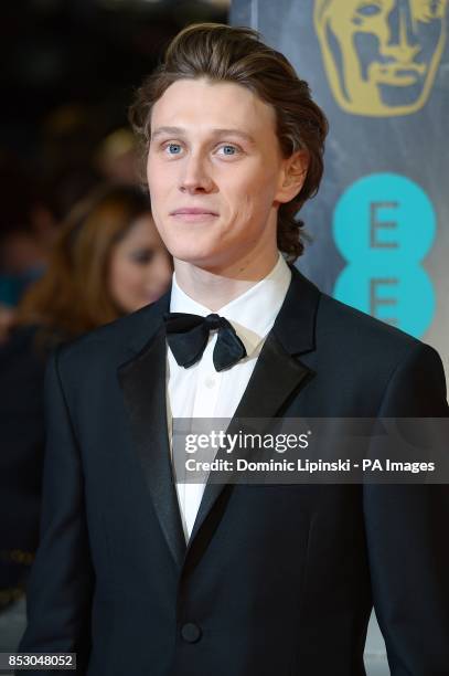 George MacKay arriving at The EE British Academy Film Awards 2014, at the Royal Opera House, Bow Street, London.