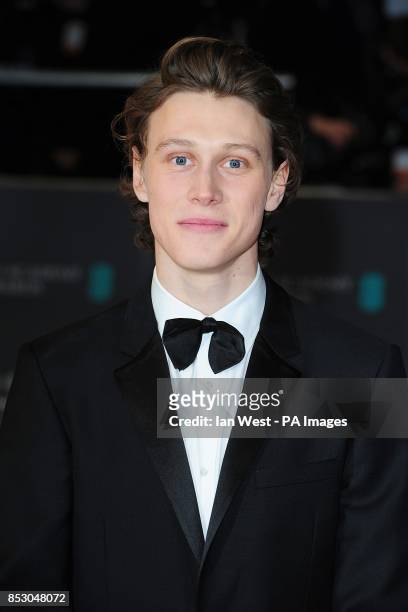 George MacKay arriving at The EE British Academy Film Awards 2014, at the Royal Opera House, Bow Street, London.