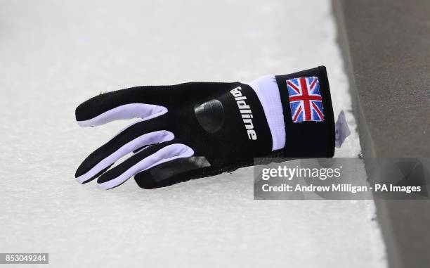 Curling glove during the Women's Curling Round Robin match at the Ice Cube Curling Centre, during the 2014 Sochi Olympic Games in Sochi, Russia....