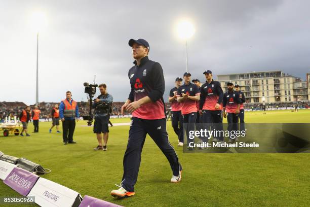 Eoin Morgan the captain of England leads his team off the field following his sides 124 run victory during the third Royal London One Day...