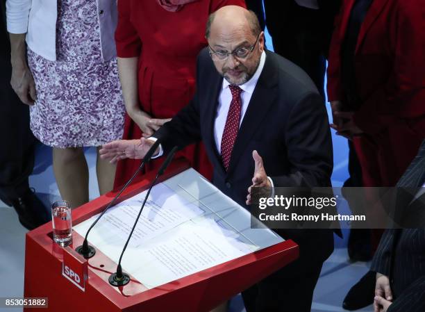 German Social Democrat and chancellor candidate Martin Schulz reacts to initial results that give the party 20,8% of the vote, giving it a second...