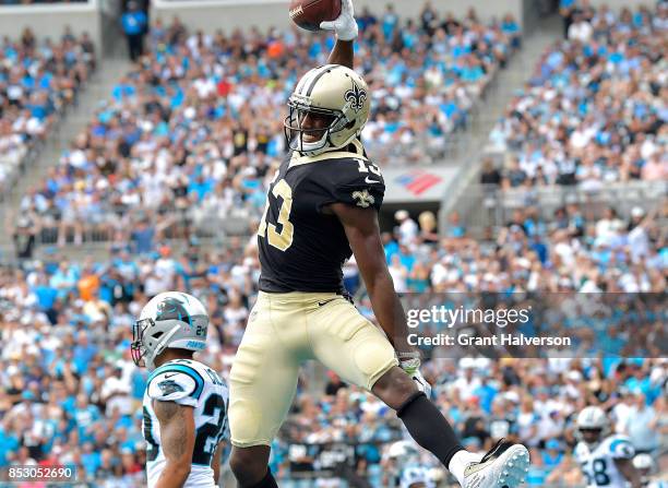 Michael Thomas of the New Orleans Saints reacts after scoring a touchdown against the Carolina Panthers during their game at Bank of America Stadium...