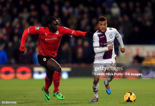 Aston Villa's Ryan Bertrand holds off a challenge from Cardiff City's Kenwyne Jones