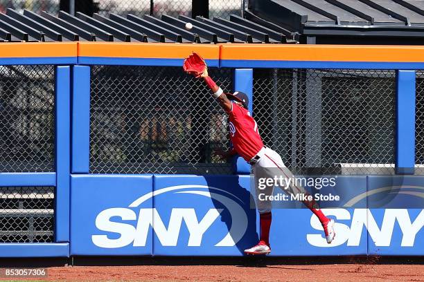 Michael Taylor of the Washington Nationals catches a ball off the bat of Jose Reyes of the New York Mets in the first inning at Citi Field on...