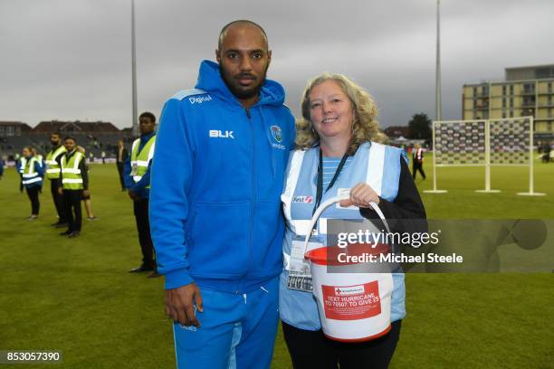 Sunil Ambris of West Indies with Liz a volunteer collecting on behalf of the British Red Cross for the Hurricane appeal during the third Royal London...