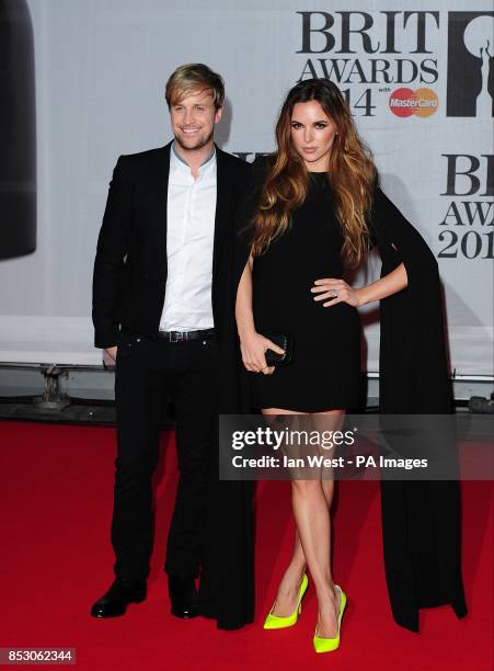 Kian Egan and Jodi Albert arriving for the 2014 Brit Awards at the O2 Arena, London.