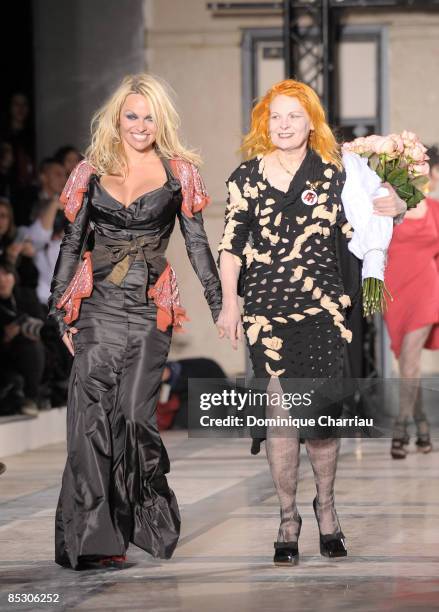 Pamela Anderson and Vivienne Westwood walk the runaway at the Vivienne Westwood Ready-to-Wear A/W 2009 fashion show during Paris Fashion Week at...