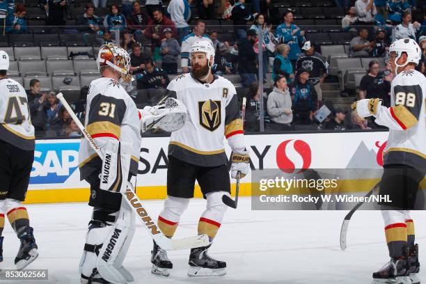 Calvin Pickard and Clayton Stoner of the Vegas Golden Knights talk during the game against the San Jose Sharks at SAP Center on September 21, 2017 in...