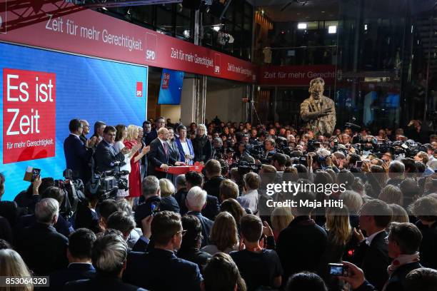 German Social Democrat and chancellor candidate Martin Schulz talks at the stage to the supporters after election results that give the party 21% of...