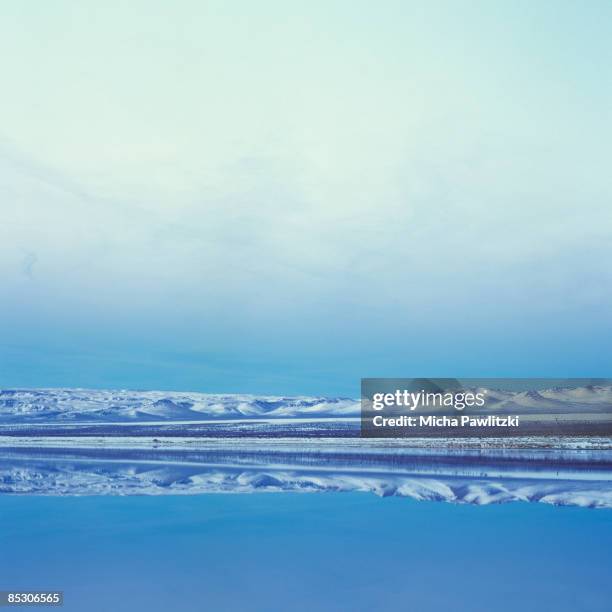 perfect reflection of snowy  mountains in lake - mono lake stock pictures, royalty-free photos & images