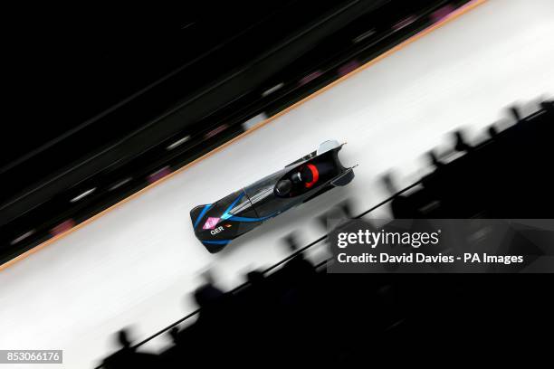Germany GER-3, piloted by Anja Schneiderheinze with brakeman Stephanie Schneider in the Women's Bobsleigh during the 2014 Sochi Olympic Games in...