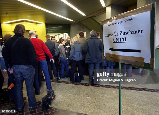 Journalists wait in line to go to the Helg Sgarbi trail at the country court on March 9, 2009 in Munich, Germany. Helg Sgarbi has been charged with...