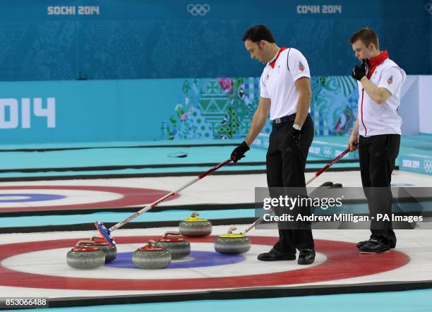 Great Britain's skip David Murdoch and Greg Drummond discuss their next shot during the Men's Gold medal match at the Ice Cube Curling Centre during...