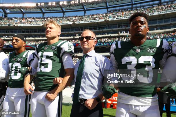 Jermaine Kearse, Josh McCown, Christopher Johnson and Jamal Adams of the New York Jets stand in unison with their team during the National Anthem...