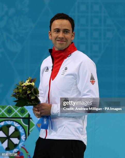 Great Britain's David Murdoch following the flower ceremony after taking Silver in the Men's Gold medal match at the Ice Cube Curling Centre during...