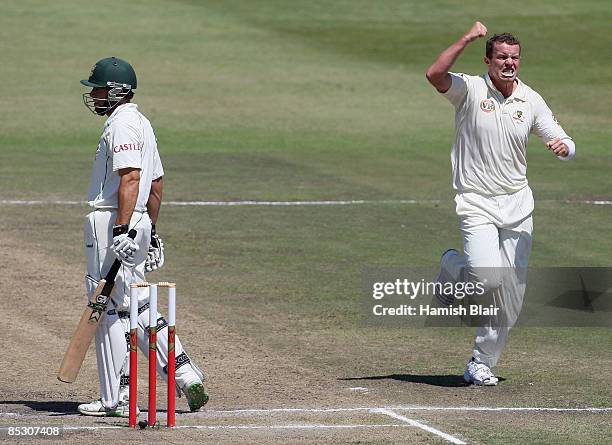 Peter Siddle of Australia celebrates the wicket of Neil McKenzie of South Africa during day four of the Second Test between South Africa and...