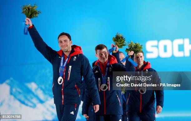 Great Britain curling skip David Murdoch leads his team after being presented with their silver medals during the 2014 Sochi Olympic Games in Sochi,...