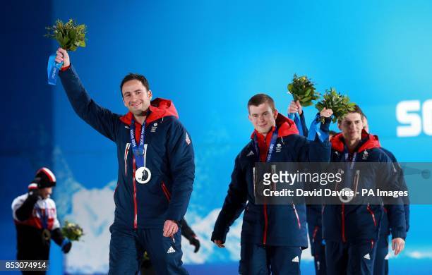 Great Britain curling skip David Murdoch leads his team after being presented with their silver medals during the 2014 Sochi Olympic Games in Sochi,...