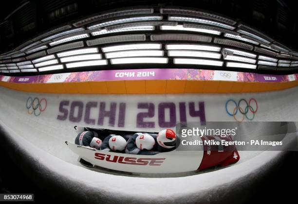 Switzerland -1 in run 3 of the men's 4 man Bobsleigh at the Sanki Sliding Centre during the 2014 Sochi Olympic Games in Krasnaya Polyana, Russia.