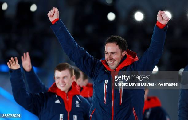Great Britain Mens Curling Skip David Murdoch celebrates as he leads his team to the stage to receive their Silver medals during the 2014 Sochi...